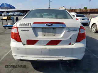 2012 Ford Fusion Hybrid z VIN 3FADP0L38CR171141, wystawiony jako Copart lot #61492425 z przebiegiem 275 312 mil mil oraz Czysty tytuł • Clean title. Historia ofert i sprzedaży dostępna na DreamBid. Obrazek 6.