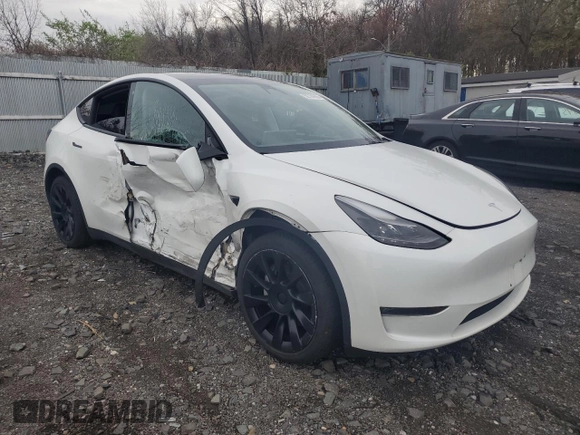2023 Tesla Model Y Long Range with VIN 7SAYGDEE0PF746778, listed as a Copart auction lot 52704965 with 19,047 mi miles and Salvage Title. Bid and sale history available at DreamBid. Image 4.