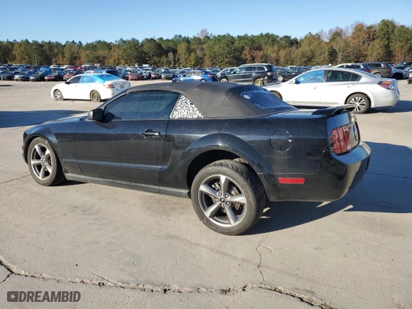 2005 Ford Mustang Deluxe with VIN 1ZVFT84N655188200, listed as a Copart auction lot 82826514 with NaN miles and Salvage Title. Bid and sale history available at carsss.com. Image 2.