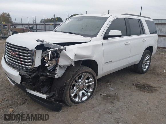 2018 GMC Yukon SLT with VIN 1GKS1BKC3JR279163, listed as a IAAI auction lot 40973940 with 122,445 mi miles. Bid and sale history available at carsss.com. Image 17.