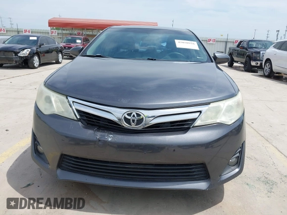 2014 Toyota Camry L with VIN 4T4BF1FKXER379158, listed as a IAAI auction lot 42050926 with 88,060 mi miles and . Bid and sale history available at DreamBid. Image 12.