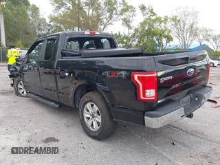 2017 Ford F-150 XL with VIN 1FTEX1E87HKD63188, listed as a IAAI auction lot 41674011 with 86,939 mi miles and . Bid and sale history available at carsss.com. Image 3.