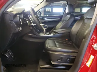 2018 Alfa Romeo Stelvio Sport z VIN ZASFAKPNXJ7B93360, wystawiony jako Copart lot #49785475 z przebiegiem 106 167 mil mil oraz Tytuł czysty. Historia ofert i sprzedaży dostępna na DreamBid. Obrazek 7.