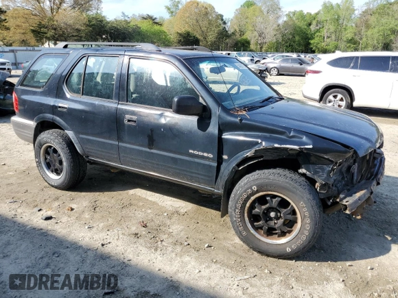 2000 Isuzu Rodeo S with VIN 4S2CK58W7Y4309261, listed as a Copart auction lot 54000775 with 187,949 mi miles and Salvage title. Bid and sale history available at DreamBid. Image 4.