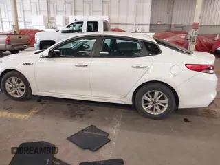 2016 Kia Optima LX with VIN 5XXGT4L31GG046321, listed as a IAAI auction lot 41847730 with 88,439 mi miles. Bid and sale history available at carsss.com. Image 14.