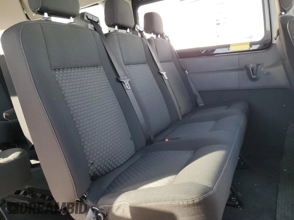 2023 Ford Transit Passenger XL with VIN 1FBVU4XG3PKA55923, listed as a Copart auction lot 47928165 with 83,174 mi miles and Salvage title. Bid and sale history available at DreamBid. Image 11.