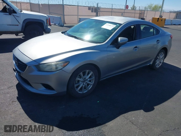 2014 Mazda 6 i Sport with VIN JM1GJ1U61E1151348, listed as a IAAI auction lot 42248173 with 275,764 mi miles and . Bid and sale history available at DreamBid. Image 13.