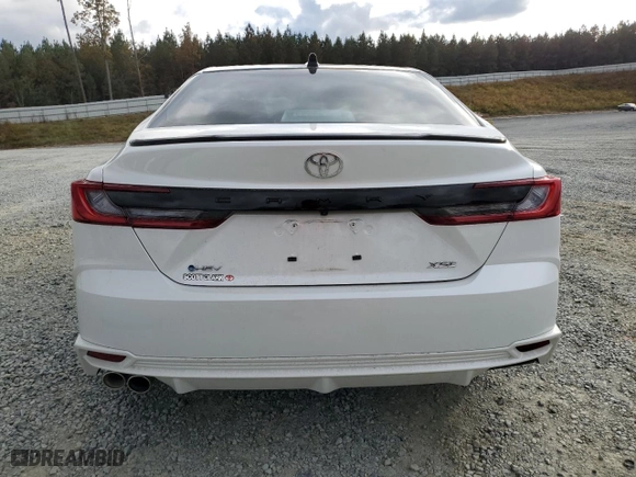 2025 Toyota Camry LE with VIN 4T1DAACK9SU002466, listed as a Copart auction lot 79658094 with 10,802 mi miles and Salvage Title. Bid and sale history available at carsss.com. Image 6.