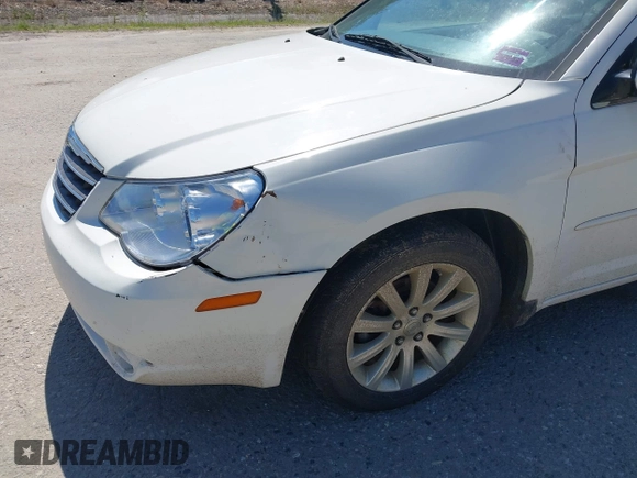 2010 Chrysler Sebring Limited with VIN 1C3CC5FD9AN199621, listed as a IAAI auction lot 42616882 with 110,512 mi miles and . Bid and sale history available at DreamBid. Image 6.