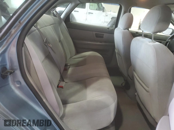 2007 Ford Taurus SE with VIN 1FAFP53U17A215432, listed as a Copart auction lot 64029215 with 121,190 mi miles and Salvage title. Bid and sale history available at DreamBid. Image 10.
