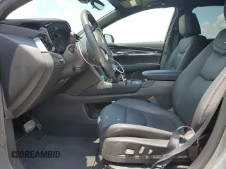 2023 Cadillac XT5 FWD Premium Luxury with VIN 1GYKNCRS3PZ135585, listed as a Copart auction lot 58891914 with 32,325 mi miles and Salvage Title. Bid and sale history available at carsss.com. Image 7.