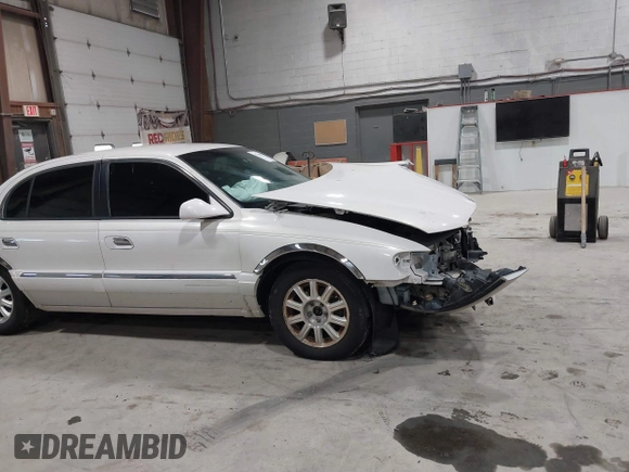 2001 Lincoln Continental with VIN 1LNHM97V81Y667328, listed as a IAAI auction lot 41730916 with 126,179 mi miles and . Bid and sale history available at DreamBid. Image 14.