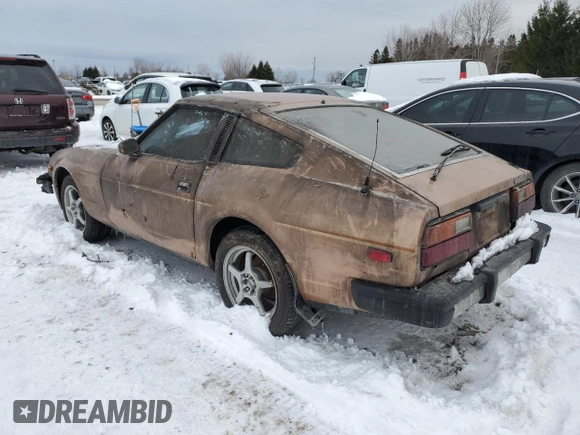 1979 Datsun 280ZX z VIN HS130137808, wystawiony jako Copart lot #43799165 z przebiegiem 28 995 mil mil oraz Tytuł czysty. Historia ofert i sprzedaży dostępna na DreamBid. Obrazek 2.