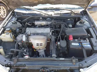 2000 Toyota Camry CE z VIN 4T1BG22K5YU989265, wystawiony jako IAAI lot #41800338 z przebiegiem 381 964 mil mil oraz . Historia ofert i sprzedaży dostępna na DreamBid. Obrazek 10.
