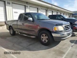 2002 Ford F-150 XL with VIN 2FTRX17232CA25728, listed as a Copart auction lot 54478365 with Not provided miles and Salvage title. Bid and sale history available at DreamBid. Image 4.