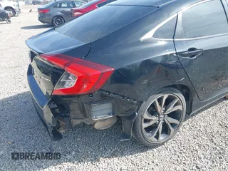2019 Honda Civic Sport with VIN 19XFC2F86KE045495, listed as a IAAI auction lot 42074631 with 52,864 mi miles and . Bid and sale history available at DreamBid. Image 6.