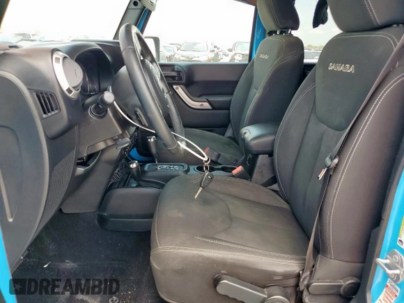 2017 Jeep Wrangler Unlimited Sahara with VIN 1C4BJWEGXHL726148, listed as a Copart auction lot 60144605 with 106,702 mi miles and Salvage title. Bid and sale history available at DreamBid. Image 7.