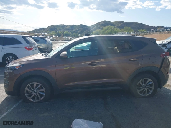 2016 Hyundai Tucson SE with VIN KM8J23A47GU166435, listed as a IAAI auction lot 41952751 with 66,785 mi miles. Bid and sale history available at carsss.com. Image 13.