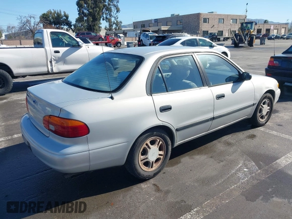 2000 Chevrolet Prizm z VIN 1Y1SK548XYZ426149, wystawiony jako IAAI lot #41495791 z przebiegiem 127 968 mil mil oraz . Historia ofert i sprzedaży dostępna na DreamBid. Obrazek 4.