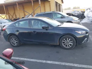 2015 Mazda 3 i Grand Touring with VIN JM1BM1W71F1226283, listed as a IAAI auction lot 41450177 with 136,621 mi miles and . Bid and sale history available at DreamBid. Image 13.