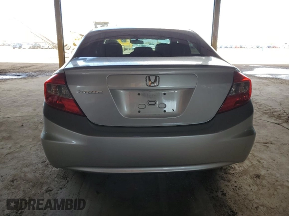 2012 Honda Civic LX z VIN 2HGFB2F59CH580899, wystawiony jako Copart lot #59803775 z przebiegiem 96 323 mil mil oraz Szkoda całkowita • Salvage title. Historia ofert i sprzedaży dostępna na DreamBid. Obrazek 6.