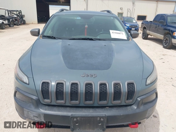 2015 Jeep Cherokee Trailhawk with VIN 1C4PJMBS0FW524479, listed as a IAAI auction lot 41908871 with 118,825 mi miles and . Bid and sale history available at DreamBid. Image 12.
