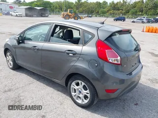 2016 Ford Fiesta SE with VIN 3FADP4EJ4GM129006, listed as a IAAI auction lot 42085892 with 146,044 mi miles. Bid and sale history available at carsss.com. Image 3.