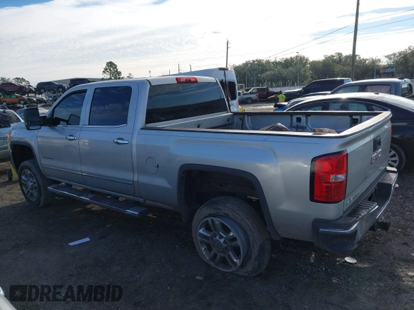 2015 GMC Sierra 2500HD available WiFi SLT with VIN 1GT12ZEG7FF167096, listed as a IAAI auction lot 41408317 with 152,969 mi miles. Bid and sale history available at carsss.com. Image 14.