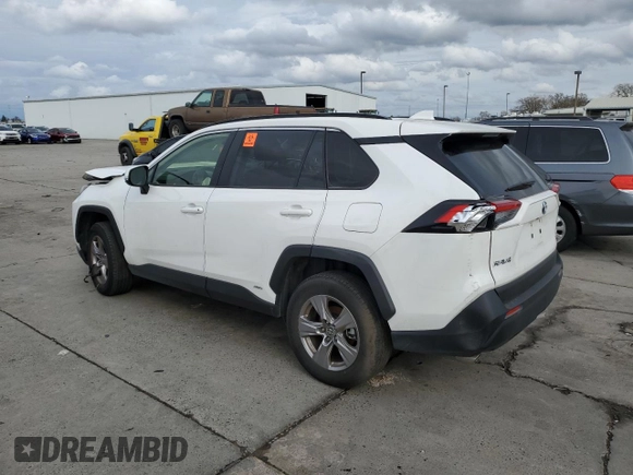 2023 Toyota RAV4 Hybrid LE with VIN JTMMWRFV3PD570648, listed as a Copart auction lot 86983174 with 27,258 mi miles and Salvage title. Bid and sale history available at DreamBid. Image 2.