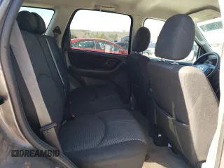 2006 Mazda Tribute S with VIN 4F2YZ04176KM19634, listed as a Copart auction lot 46796315 with 276,632 mi miles and Salvage Title. Bid and sale history available at DreamBid. Image 10.