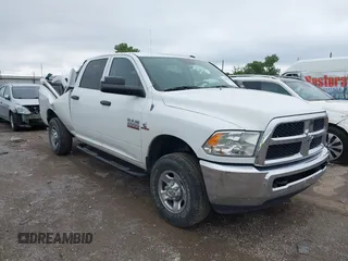 2013 Ram 2500 Tradesman z VIN 3C6UR5CL5DG615047, wystawiony jako IAAI lot #42379845 z przebiegiem 132 528 mil mil oraz . Historia ofert i sprzedaży dostępna na DreamBid. Obrazek 1.