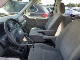 2003 Volkswagen EuroVan MV с VIN WV2MB47023H044047, выставлен на аукционе Copart как лот 71014624 с пробегом 189 485 миль миль и Чистый • Clean title. История ставок и продаж доступна на DreamBid. Изображение 7.