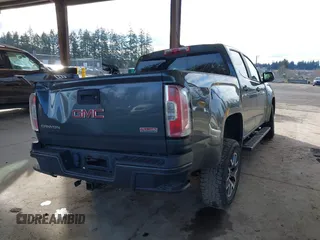 2015 GMC Canyon 2WD SLE with VIN 1GTG5BE37F1265497, listed as a IAAI auction lot 41507236 with 101,385 mi miles. Bid and sale history available at carsss.com. Image 4.