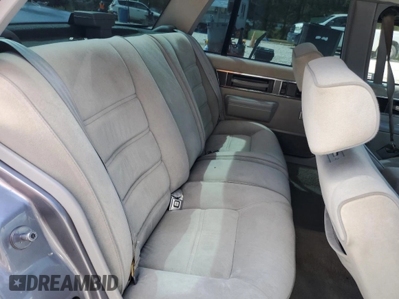 1991 Oldsmobile 88 z VIN 1G3HY54C4MH336805, wystawiony jako Copart lot #73367654 z przebiegiem 168 436 mil mil oraz Szkoda całkowita • Salvage title. Historia ofert i sprzedaży dostępna na DreamBid. Obrazek 10.