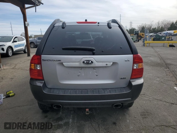 2005 Kia Sportage LX with VIN KNDJE723457117231, listed as a Copart auction lot 50163165 with 97,273 mi miles and Salvage Title. Bid and sale history available at carsss.com. Image 6.