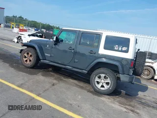 2017 Jeep Wrangler Unlimited Sahara with VIN 1C4HJWEG3HL648158, listed as a IAAI auction lot 42416132 with 95,954 mi miles and . Bid and sale history available at DreamBid. Image 3.