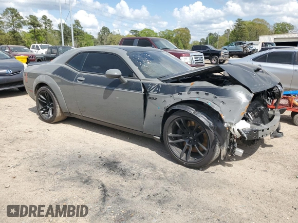 2023 Dodge Challenger R/T Scat Pack Widebody z VIN 2C3CDZFJ2PH694352, wystawiony jako Copart lot #50634415 z przebiegiem 5 340 mil mil oraz Szkoda całkowita • Salvage title. Historia ofert i sprzedaży dostępna na DreamBid. Obrazek 4.