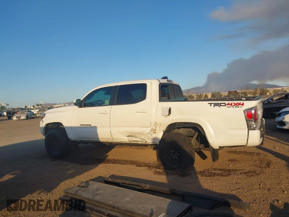 2023 Toyota Tacoma 4WD SR with VIN 3TMCZ5AN8PM647845, listed as a IAAI auction lot 41371634 with 21,917 mi miles. Bid and sale history available at carsss.com. Image 15.