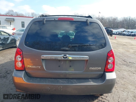 2006 Mazda Tribute LX with VIN 4F2YZ94126KM19822, listed as a IAAI auction lot 41534784 with 193,467 mi miles and . Bid and sale history available at DreamBid. Image 16.
