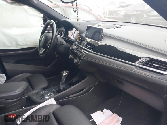 2019 BMW X2 sDrive28i with VIN WBXYJ3C58KEP77334, listed as a IAAI auction lot 42575165 with 98,910 mi miles and . Bid and sale history available at DreamBid. Image 5.