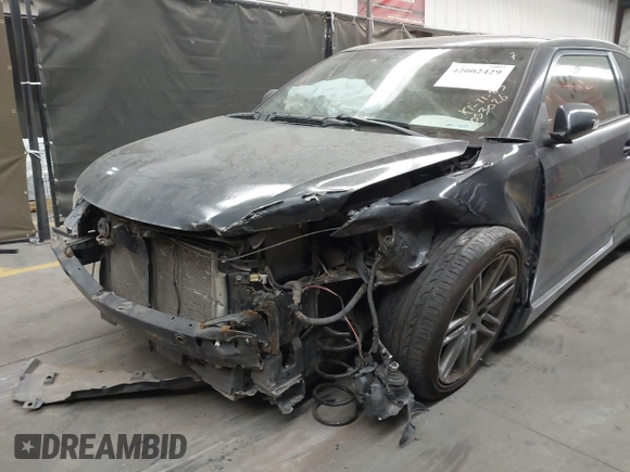 2013 Scion tC z VIN JTKJF5C79D3053026, wystawiony jako IAAI lot #42002429 z przebiegiem 95 774 mil mil oraz . Historia ofert i sprzedaży dostępna na DreamBid. Obrazek 6.