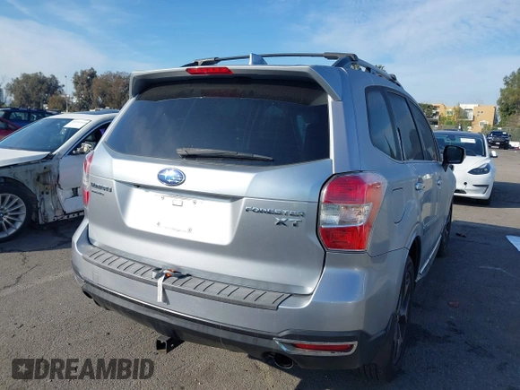2016 Subaru Forester 2.0XT Touring with VIN JF2SJGXC7GH542997, listed as a IAAI auction lot 41528902 with 116,862 mi miles. Bid and sale history available at carsss.com. Image 4.