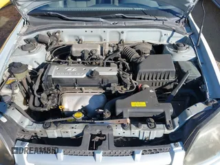 2004 Hyundai Accent GL with VIN KMHCG45C14U547954, listed as a IAAI auction lot 41350219 with 138,436 mi miles. Bid and sale history available at carsss.com. Image 10.