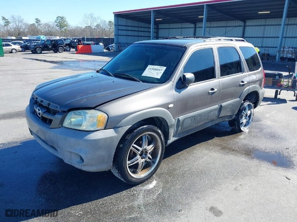 2006 Mazda Tribute i with VIN 4F2YZ02Z66KM05605, listed as a IAAI auction lot 41508057 with 266,708 mi miles. Bid and sale history available at carsss.com. Image 2.