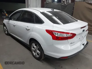 2014 Ford Focus SE with VIN 1FADP3F22EL437727, listed as a IAAI auction lot 42001593 with 90,814 mi miles. Bid and sale history available at carsss.com. Image 3.