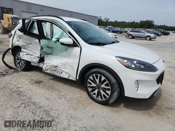 2020 Ford Escape Titanium z VIN 1FMCU9J91LUB53076, wystawiony jako Copart lot #64008765 z przebiegiem Nie podano mil oraz Nie do naprawy • Non repairable. Historia ofert i sprzedaży dostępna na DreamBid. Obrazek 4.