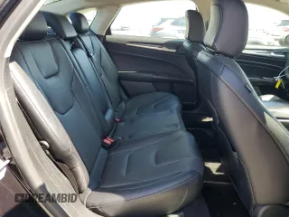 2020 Ford Fusion Titanium z VIN 3FA6P0RU3LR231920, wystawiony jako Copart lot #61643035 z przebiegiem 55 855 mil mil oraz Szkoda całkowita • Salvage title. Historia ofert i sprzedaży dostępna na DreamBid. Obrazek 10.
