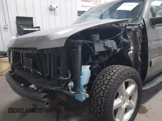 2011 Chevrolet Tahoe LT with VIN 1GNSKBE03BR268246, listed as a IAAI auction lot 41434862 with 250,991 mi miles and . Bid and sale history available at DreamBid. Image 6.