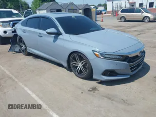 2022 Honda Accord Touring z VIN 1HGCV2F93NA011528, wystawiony jako IAAI lot #42017654 z przebiegiem 16 970 mil mil oraz . Historia ofert i sprzedaży dostępna na DreamBid. Obrazek 1.
