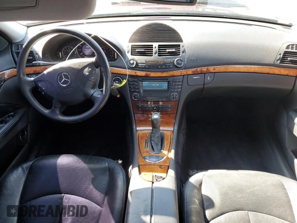2003 Mercedes-Benz E-Class 5.0L with VIN WDBUF70J13A141237, listed as a Copart auction lot 73498264 with 138,623 mi miles and Salvage Title. Bid and sale history available at carsss.com. Image 8.